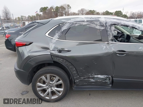 2022 Mazda CX-30 S Premium with VIN 3MVDMBDL9NM434619, listed as a IAAI auction lot 41620655 with 46,557 mi miles and . Bid and sale history available at carsss.com. Image 6.