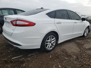 2014 Ford Fusion SE with VIN 1FA6P0H75E5379472, listed as a Copart auction lot 63853861 with 180,086 mi miles and Salvage Title. Bid and sale history available at carsss.com. Image 4.