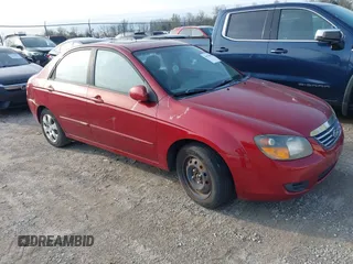 2009 Kia Spectra EX with VIN KNAFE221095634712, listed as a IAAI auction lot 41930897 with 165,185 mi miles. Bid and sale history available at carsss.com. Image 1.