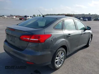 2017 Ford Focus SE with VIN 1FADP3F29HL220261, listed as a IAAI auction lot 42101315 with 152,267 mi miles. Bid and sale history available at carsss.com. Image 4.