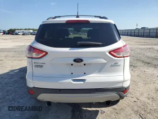 2013 Ford Escape SE with VIN 1FMCU0GX3DUA19981, listed as a Copart auction lot 60905255 with 212,730 mi miles and Salvage title. Bid and sale history available at DreamBid. Image 6.