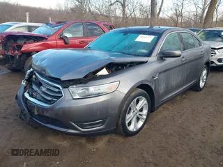 2013 Ford Taurus SEL z VIN 1FAHP2E84DG193376, wystawiony jako IAAI lot #41661721 z przebiegiem 136 341 mil mil oraz . Historia ofert i sprzedaży dostępna na DreamBid. Obrazek 2.