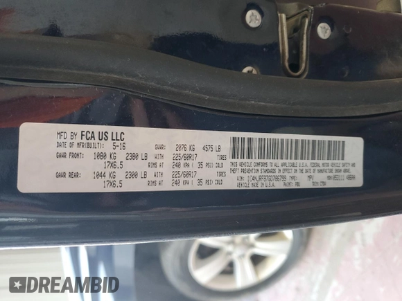2016 Jeep Patriot High Altitude with VIN 1C4NJRFB7GD786799, listed as a Copart auction lot 58235925 with 97,780 mi miles and Salvage title. Bid and sale history available at DreamBid. Image 13.