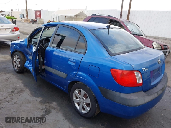 2008 Kia Rio LX with VIN KNADE123486365738, listed as a IAAI auction lot 41902367 with 248,194 mi miles. Bid and sale history available at carsss.com. Image 3.