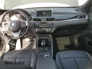 2020 BMW X1 xDrive28i with VIN WBXJG9C06L5P89796, listed as a Copart auction lot 52817235 with 95,665 mi miles and Salvage title. Bid and sale history available at DreamBid. Image 8.