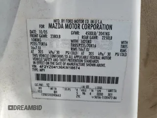 2006 Mazda Tribute S with VIN 4F2YZ04136KM18674, listed as a Copart auction lot 65126554 with 186,941 mi miles and Clean Title. Bid and sale history available at carsss.com. Image 13.
