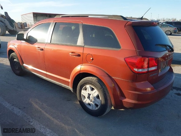 2012 Dodge Journey SE with VIN 3C4PDCAB8CT297188, listed as a IAAI auction lot 41661370 with 157,803 mi miles. Bid and sale history available at carsss.com. Image 3.