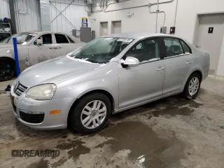 2006 Volkswagen Jetta z VIN 3VWRF31K86M618158, wystawiony jako Copart lot #42728175 z przebiegiem 117 433 mil mil oraz Czysty tytuł • Clean title. Historia ofert i sprzedaży dostępna na DreamBid. Obrazek 1.