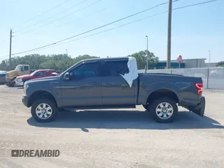 2018 Ford F-150 XL z VIN 1FTEW1EP8JFD63788, wystawiony jako IAAI lot #42252446 z przebiegiem 52 611 mil mil oraz . Historia ofert i sprzedaży dostępna na DreamBid. Obrazek 14.