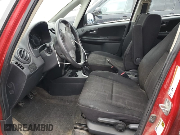 2012 Suzuki SX4 Crossover with VIN JS2YB5A38C6301805, listed as a Copart auction lot 82834774 with 141,858 mi miles and Salvage Title. Bid and sale history available at carsss.com. Image 7.