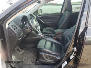 2015 Mazda CX-5 Grand Touring with VIN JM3KE4DY9F0516357, listed as a Copart auction lot 53156215 with 118,621 mi miles and Salvage Title. Bid and sale history available at DreamBid. Image 7.