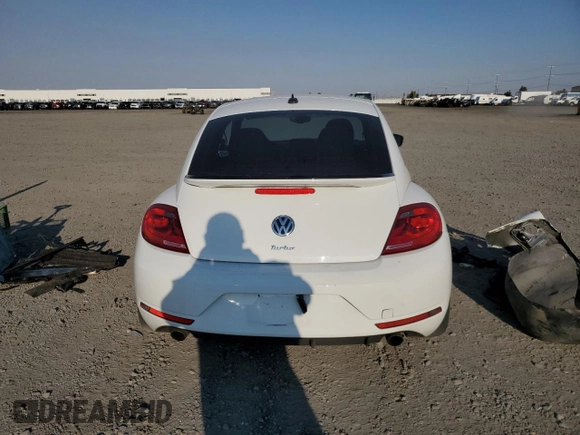 2016 Volkswagen Beetle Turbo R-Line with VIN 3VWVT7AT9GM602303, listed as a Copart auction lot 63845354 with 65,796 mi miles and Salvage Title. Bid and sale history available at DreamBid. Image 6.