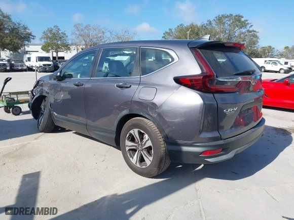 2020 Honda CR-V LX with VIN 7FARW1H29LE009775, listed as a IAAI auction lot 41571693 with 60,794 mi miles. Bid and sale history available at carsss.com. Image 3.