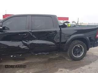 2022 Ram 1500 Big Horn with VIN 1C6SRFFT3NN287385, listed as a IAAI auction lot 41793596 with 12,277 mi miles and . Bid and sale history available at DreamBid. Image 18.