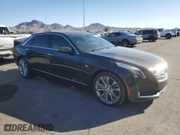 2016 Cadillac CT6 Platinum AWD with VIN 1G6KK5R61GU165052, listed as a Copart auction lot 54900225 with 73,146 mi miles and Salvage title. Bid and sale history available at DreamBid. Image 4.