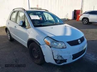 2012 Suzuki SX4 Crossover with VIN JS2YB5A37C6301245, listed as a IAAI auction lot 41548580 with 122,601 mi miles and . Bid and sale history available at DreamBid. Image 6.