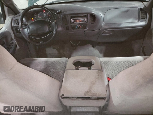 2001 Ford F-150 XLT with VIN 1FTRW08W41KD98737, listed as a Copart auction lot 64695065 with 179,158 mi miles and Clean title. Bid and sale history available at DreamBid. Image 8.