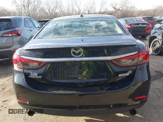 2014 Mazda 6 i Grand Touring with VIN JM1GJ1W66E1162519, listed as a IAAI auction lot 41801957 with 121,586 mi miles. Bid and sale history available at carsss.com. Image 16.