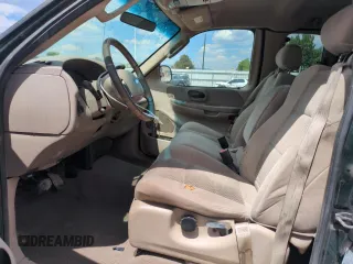 2003 Ford F-150 XL with VIN 2FTRX172X3CA58789, listed as a Copart auction lot 57986695 with 160,124 mi miles and Salvage title. Bid and sale history available at DreamBid. Image 7.