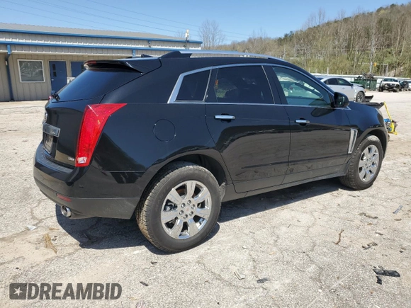 2014 Cadillac SRX Luxury Collection z VIN 3GYFNEE32ES647165, wystawiony jako Copart lot #52331335 z przebiegiem 27 277 mil mil oraz Szkoda całkowita • Salvage title. Historia ofert i sprzedaży dostępna na DreamBid. Obrazek 3.