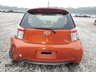 2012 Scion iQ with VIN JTNJJXB07CJ017816, listed as a Copart auction lot 59616355 with 141,384 mi miles and Salvage title. Bid and sale history available at DreamBid. Image 6.