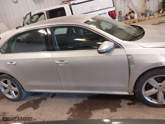 2012 Volkswagen Passat SE with VIN 1VWBH7A31CC035908, listed as a IAAI auction lot 41535111 with 119,816 mi miles. Bid and sale history available at carsss.com. Image 13.