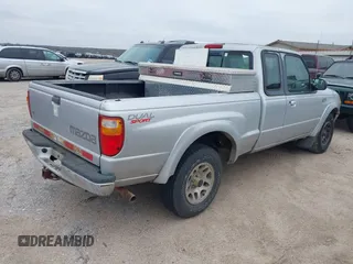 2003 Mazda B-Series 2WD Truck DS with VIN 4F4YR16V93TM16379, listed as a IAAI auction lot 41586832 with 147,300 mi miles. Bid and sale history available at carsss.com. Image 4.