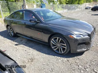 2024 Jaguar XF with VIN SAJB64FXXRCY94427, listed as a Copart auction lot 57876855 with 5,885 mi miles and Salvage title. Bid and sale history available at DreamBid. Image 4.
