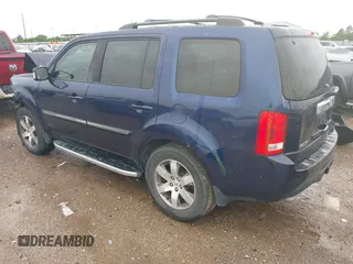 2013 Honda Pilot Touring with VIN 5FNYF4H95DB007125, listed as a IAAI auction lot 42493693 with Not provided miles and . Bid and sale history available at DreamBid. Image 3.