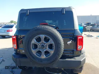 2024 Ford Bronco Big Bend z VIN 1FMDE7BH5RLA53797, wystawiony jako IAAI lot #41920749 z przebiegiem 13 399 mil mil oraz . Historia ofert i sprzedaży dostępna na DreamBid. Obrazek 16.