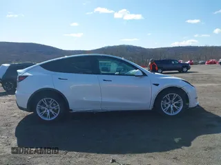 2021 Tesla Model Y Long Range with VIN 5YJYGDEE9MF239726, listed as a IAAI auction lot 41952158 with 37,088 mi miles and . Bid and sale history available at DreamBid. Image 14.