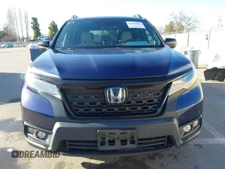 2020 Honda Passport Touring with VIN 5FNYF7H90LB004665, listed as a IAAI auction lot 41669821 with 59,768 mi miles and . Bid and sale history available at DreamBid. Image 13.