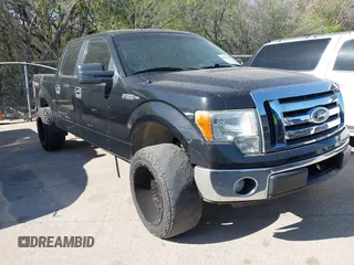 2012 Ford F-150 XL with VIN 1FTEW1CM6CKD93956, listed as a IAAI auction lot 41871235 with 129,196 mi miles. Bid and sale history available at carsss.com. Image 1.