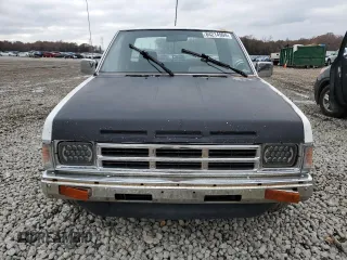 1990 Nissan Frontier with VIN 1N6SD16S9LC404281, listed as a Copart auction lot 84214904 with 279,270 mi miles and Salvage title. Bid and sale history available at DreamBid. Image 5.