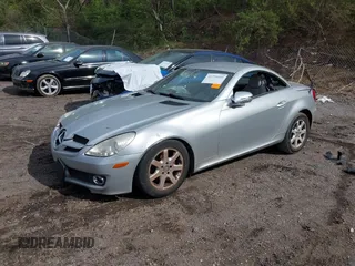 2009 Mercedes-Benz SLK-Class 3.0L with VIN WDBWK54F69F190007, listed as a IAAI auction lot 41775603 with 131,703 mi miles. Bid and sale history available at carsss.com. Image 2.