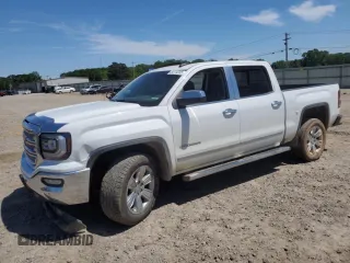 2017 GMC Sierra 1500 SLT with VIN 3GTP1NEC0HG401941, listed as a Copart auction lot 54114205 with 149,737 mi miles and Salvage title. Bid and sale history available at DreamBid. Image 1.