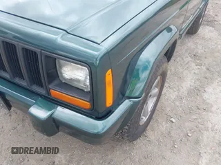 1999 Jeep Cherokee Sport with VIN 1J4FF68S5XL677243, listed as a IAAI auction lot 42221329 with 293,808 mi miles and . Bid and sale history available at DreamBid. Image 6.