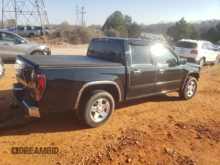 2012 GMC Canyon SLE1 with VIN 1GTD5MF90C8133699, listed as a Copart auction lot 42194595 with 111,141 mi miles and Salvage Title. Bid and sale history available at carsss.com. Image 3.