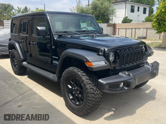 2023 Jeep Wrangler Sahara with VIN 1C4JJXP65PW627241, listed as a Copart auction lot 55661585 with 9,282 mi miles and Clean Title. Bid and sale history available at DreamBid. Image 1.