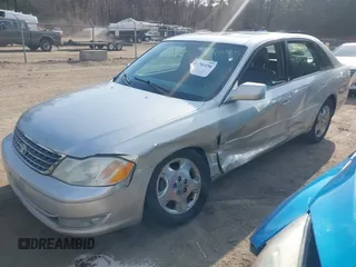 2003 Toyota Avalon XL with VIN 4T1BF28B13U285647, listed as a IAAI auction lot 41791156 with 173,323 mi miles and . Bid and sale history available at carsss.com. Image 2.