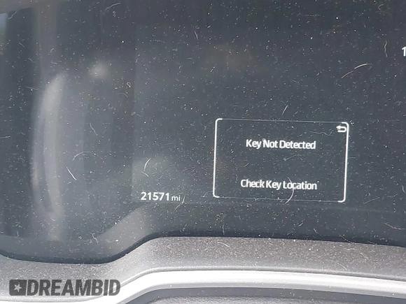 2023 Toyota Corolla Cross XLE with VIN 7MUEAABG8PV077117, listed as a IAAI auction lot 42052305 with 21,571 mi miles and . Bid and sale history available at DreamBid. Image 7.