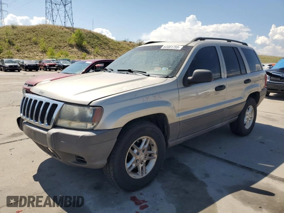 2003 Jeep Grand Cherokee Laredo with VIN 1J4GW48S23C524693, listed as a Copart auction lot 64461755 with 243,936 mi miles and Salvage title. Bid and sale history available at DreamBid. Image 1.