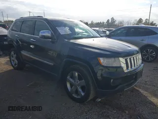2013 Jeep Grand Cherokee Overland with VIN 1C4RJECT2DC546634, listed as a IAAI auction lot 41180807 with 111,897 mi miles. Bid and sale history available at carsss.com. Image 1.