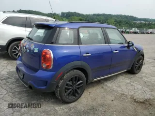 2016 MINI Countryman S with VIN WMWZC5C59GWU02414, listed as a Copart auction lot 59950285 with 106,151 mi miles and Salvage title. Bid and sale history available at DreamBid. Image 3.