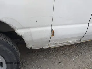 2009 Ford Econoline Cargo Commercial with VIN 1FTNE14W09DA91501, listed as a IAAI auction lot 41473298 with 99,129 mi miles and . Bid and sale history available at DreamBid. Image 6.