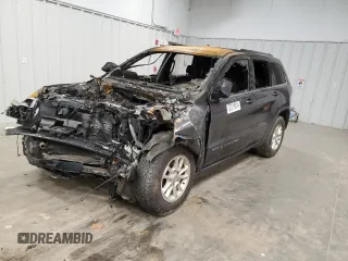 2019 Jeep Grand Cherokee Laredo E with VIN 1C4RJFAG9KC608636, listed as a Copart auction lot 87219014 with 0 mi miles and Salvage Title. Bid and sale history available at carsss.com. Image 1.