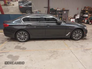 2019 BMW 5 Series 540i xDrive with VIN WBAJE7C53KWW12941, listed as a IAAI auction lot 41016611 with 77,499 mi miles and . Bid and sale history available at DreamBid. Image 13.