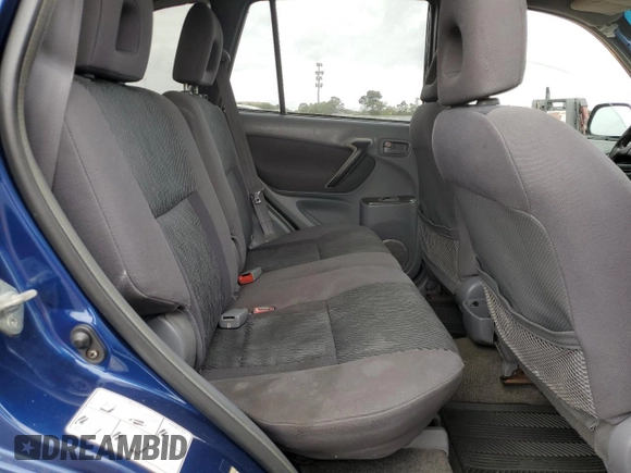2003 Toyota RAV4 z VIN JTEGH20V130110487, wystawiony jako Copart lot #72700364 z przebiegiem 197 260 mil mil oraz Szkoda całkowita • Salvage title. Historia ofert i sprzedaży dostępna na DreamBid. Obrazek 11.