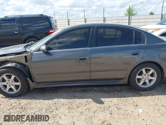 2005 Nissan Altima 2.5 S with VIN 1N4AL11D65C272888, listed as a IAAI auction lot 41895448 with 140,928 mi miles. Bid and sale history available at carsss.com. Image 15.