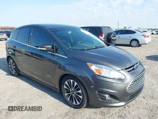 2017 Ford C-Max Energi Titanium with VIN 1FADP5FU9HL117693, listed as a IAAI auction lot 42059763 with 86,827 mi miles. Bid and sale history available at carsss.com. Image 1.